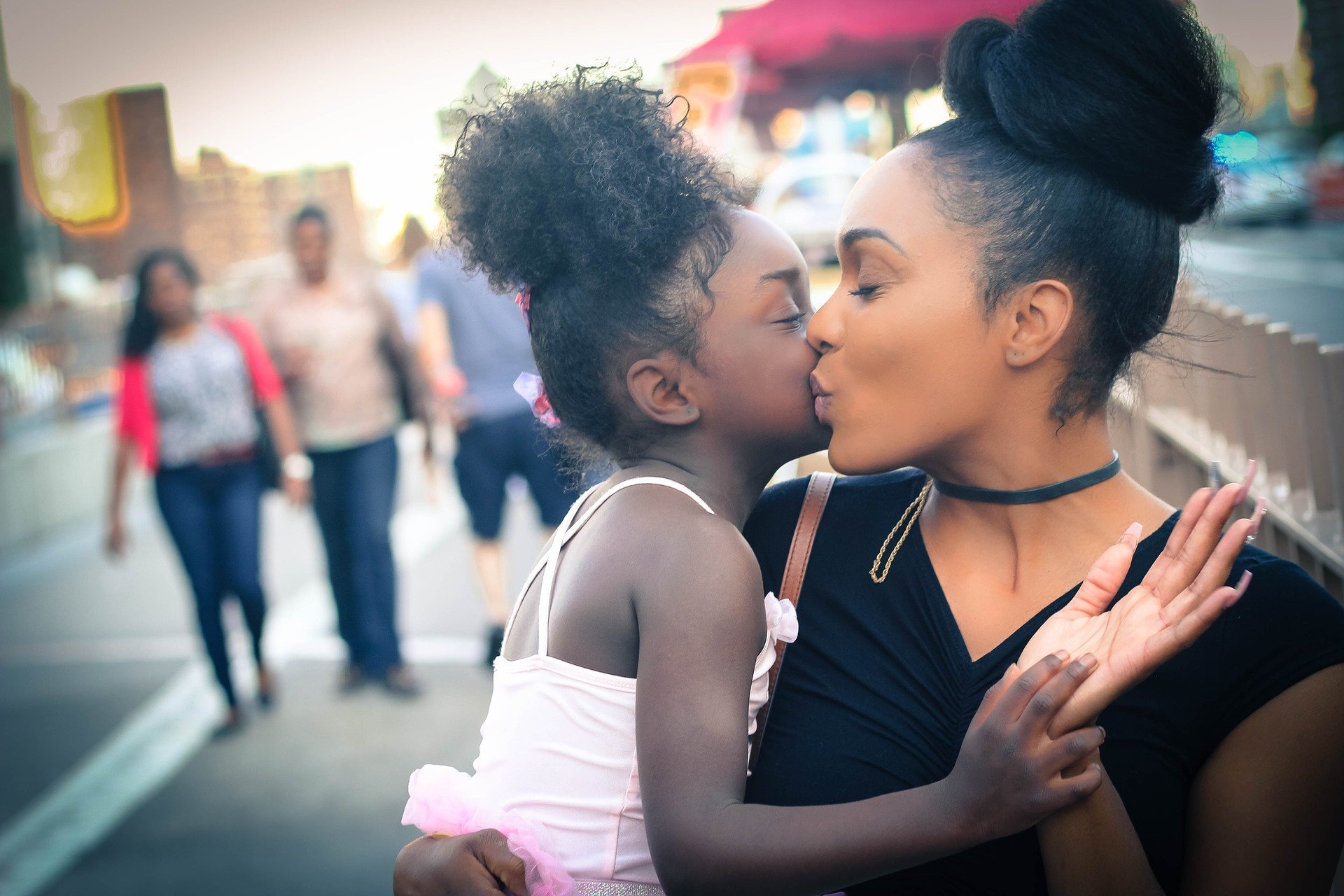 Mothing holding her daughter