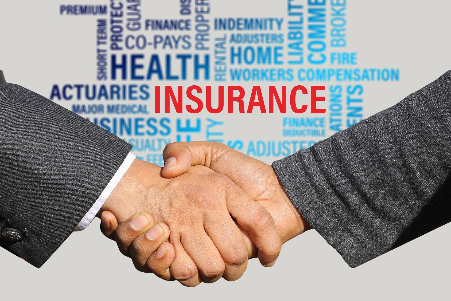 Image of Shaking Hands with Insurance Graphic in the Background